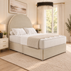 Arden Arch Divan Bed in champagne beige upholstery, three-quarter view, 54 inch headboard and closed optional drawers
