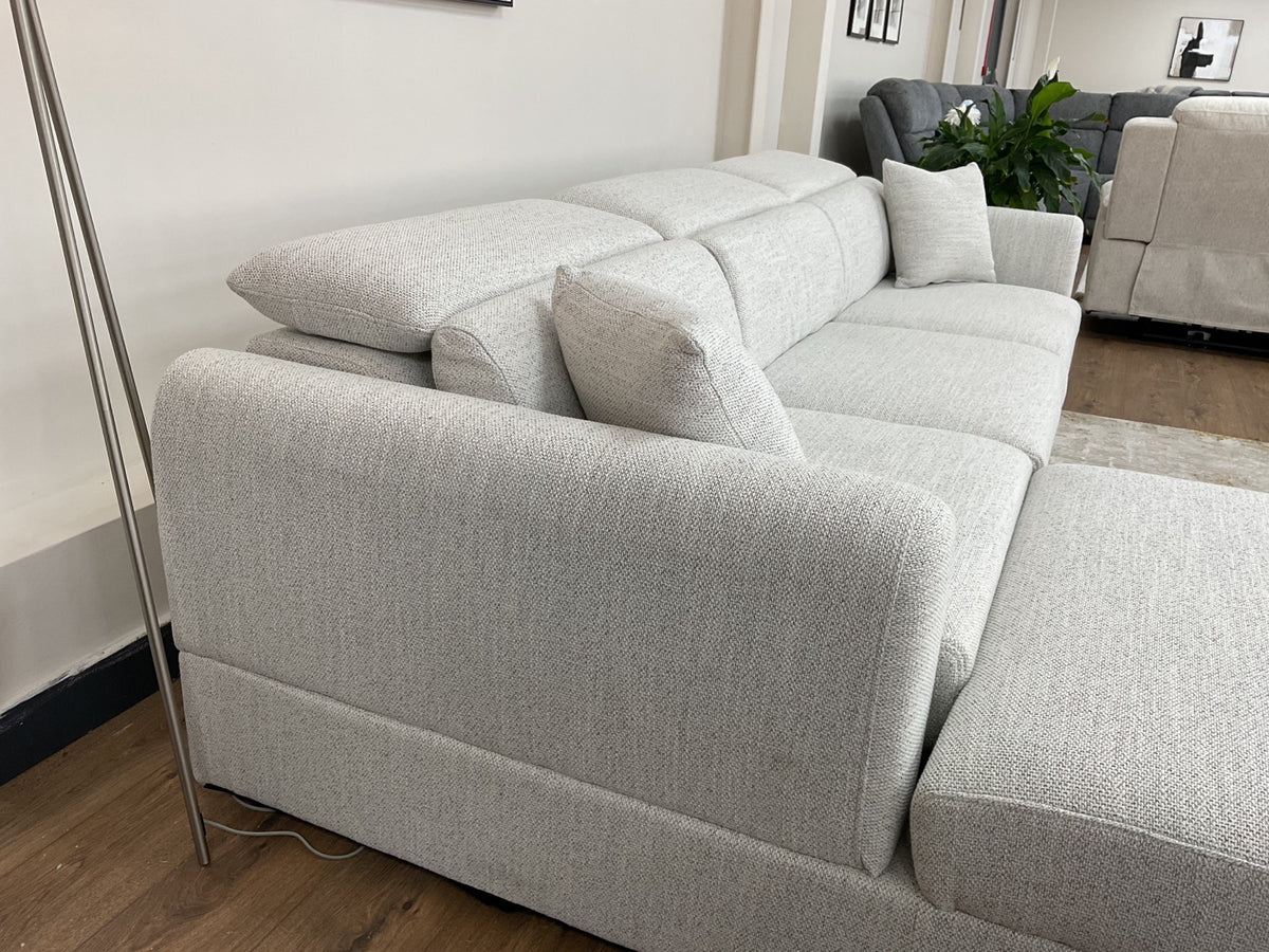 Dexter padded arm and adjustable headrests in the lowered position
