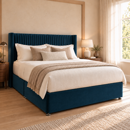 Ashbourne Divan Bed Frame, blue velvet and narrow pleated winged headboard, opposite three-quarter view. AI-generated product illustration.
