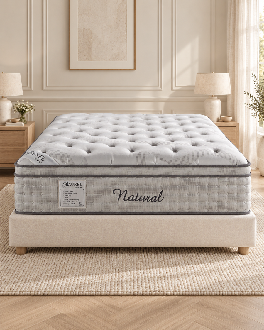 Tufted Natural mattress with grey piping in a warm ivory bedroom
