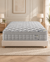 Laurel Eco Memory - Medium displayed on an ivory base in a warm neutral bedroom