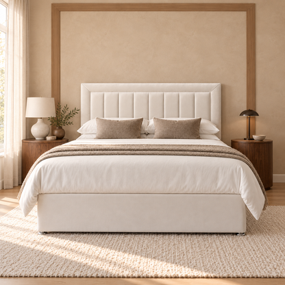 Montclair Divan Bed Frame, ivory upholstery and framed vertical-channel headboard, straight-on front view. AI-generated product illustration.