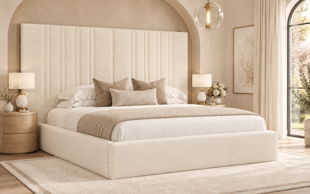 Cream Chateaux bed with a tall panelled headboard in a warm beige bedroom