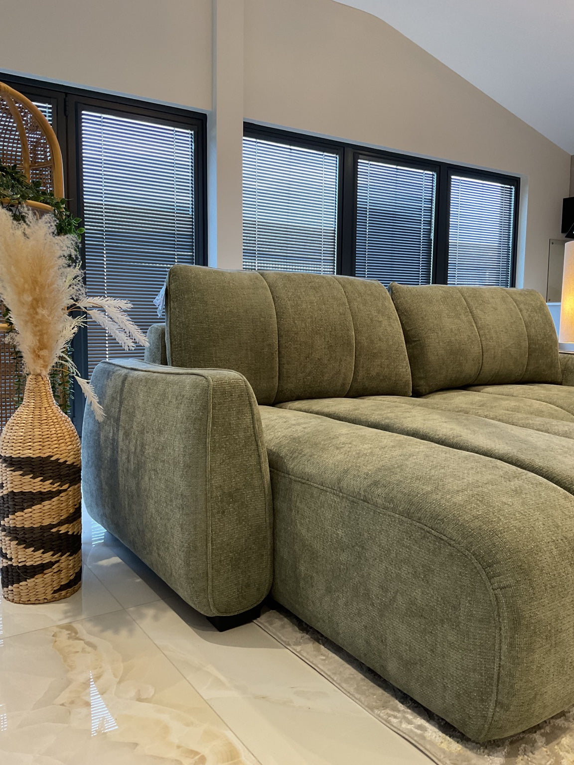 Portland Universal Storage Sofa Bed - Green — green fabric and arm detail